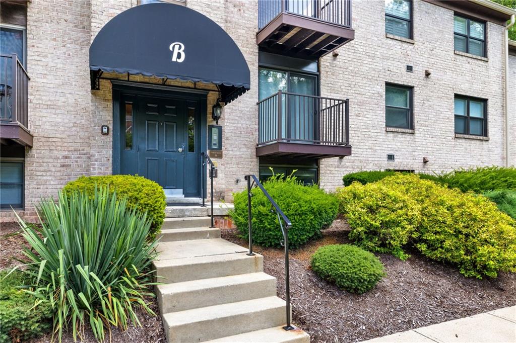300 Gilkeson Road, Unit 10B Pittsburgh, PA 15228 - Photo 3 of 31 a front view of a house with garden