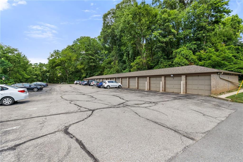 300 Gilkeson Road, Unit 10B Pittsburgh, PA 15228 - Photo 31 of 31 a view of a house with a patio