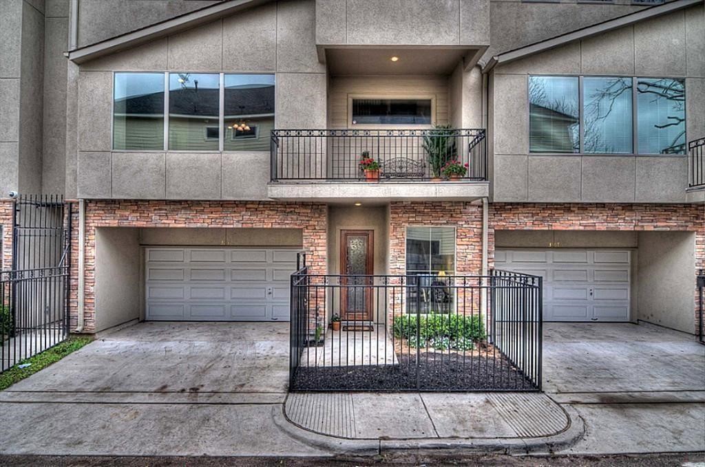 3505 Jackson Street Houston, TX 77004 - Photo 1 of 32 a front view of a house with a garden
