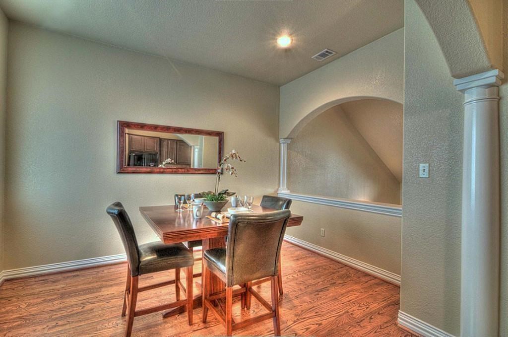 3505 Jackson Street Houston, TX 77004 - Photo 12 of 32 a view of a dining room with furniture and wooden floor