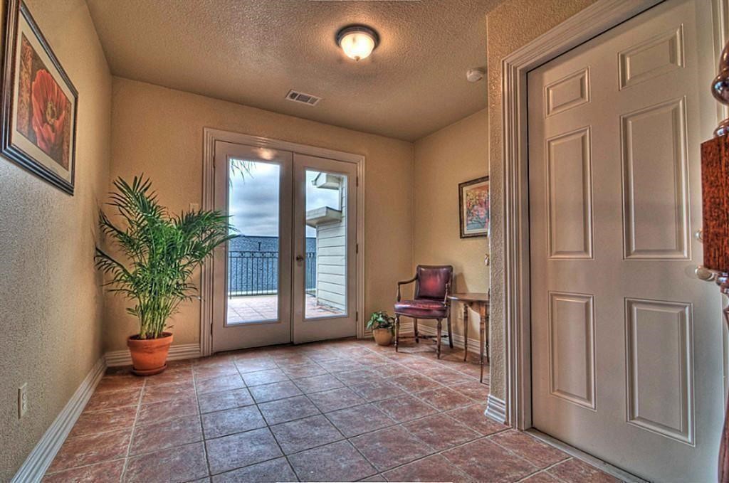 3505 Jackson Street Houston, TX 77004 - Photo 26 of 32 a view of a hallway with furniture and a potted plant