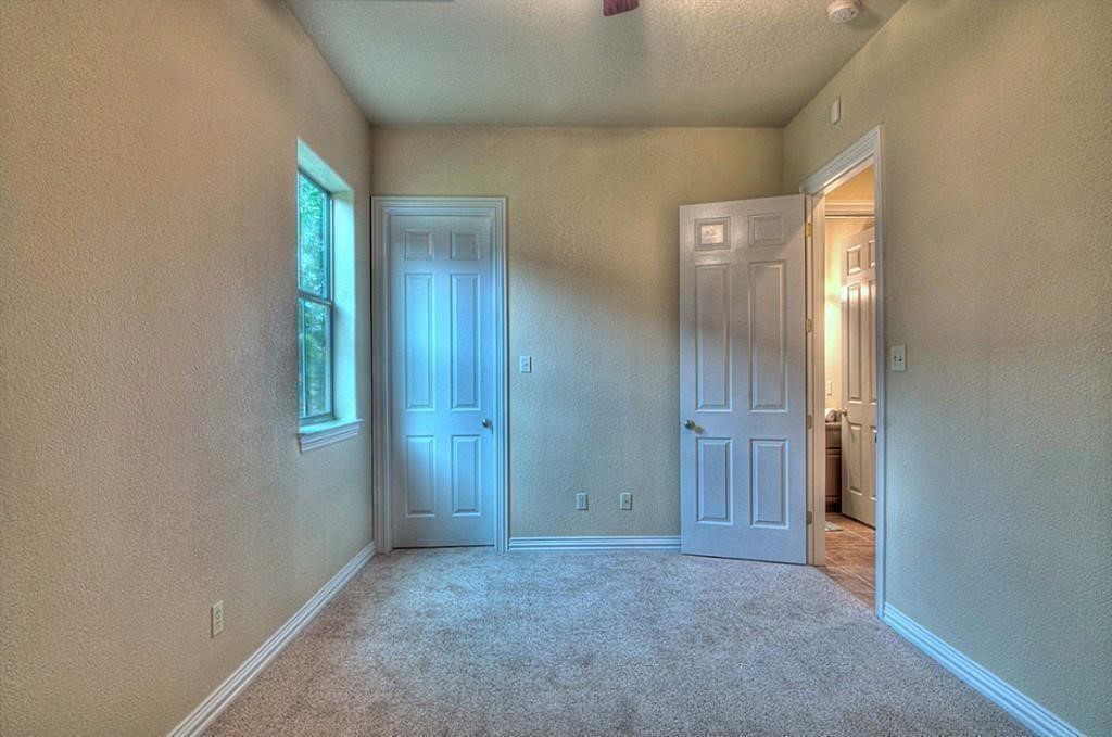 3505 Jackson Street Houston, TX 77004 - Photo 5 of 32 an empty room with windows and closet