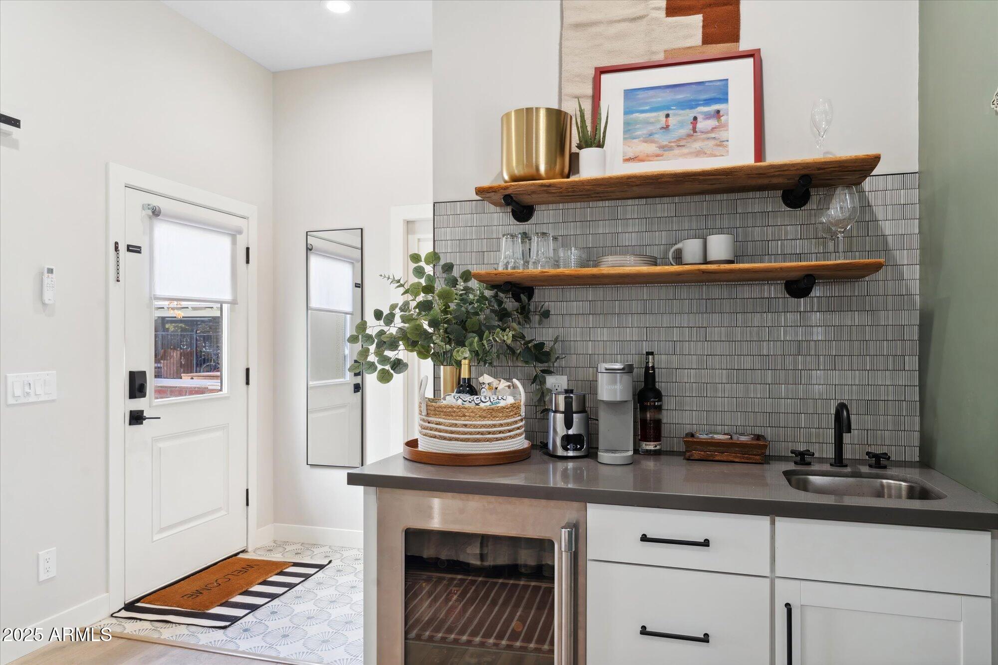 620 West McLellan Boulevard Phoenix, AZ 85013 - Photo 12 of 26 a kitchen with a sink and cabinets
