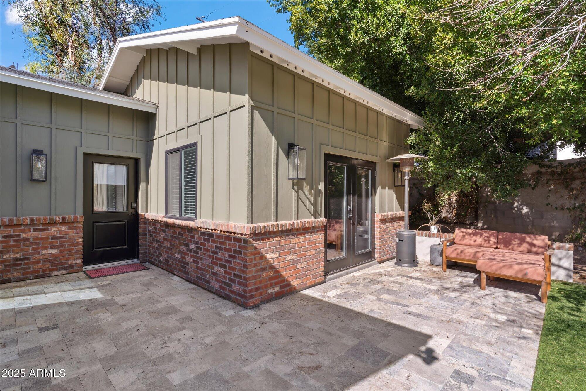 620 West McLellan Boulevard Phoenix, AZ 85013 - Photo 17 of 26 a view of a house with a yard and sitting area