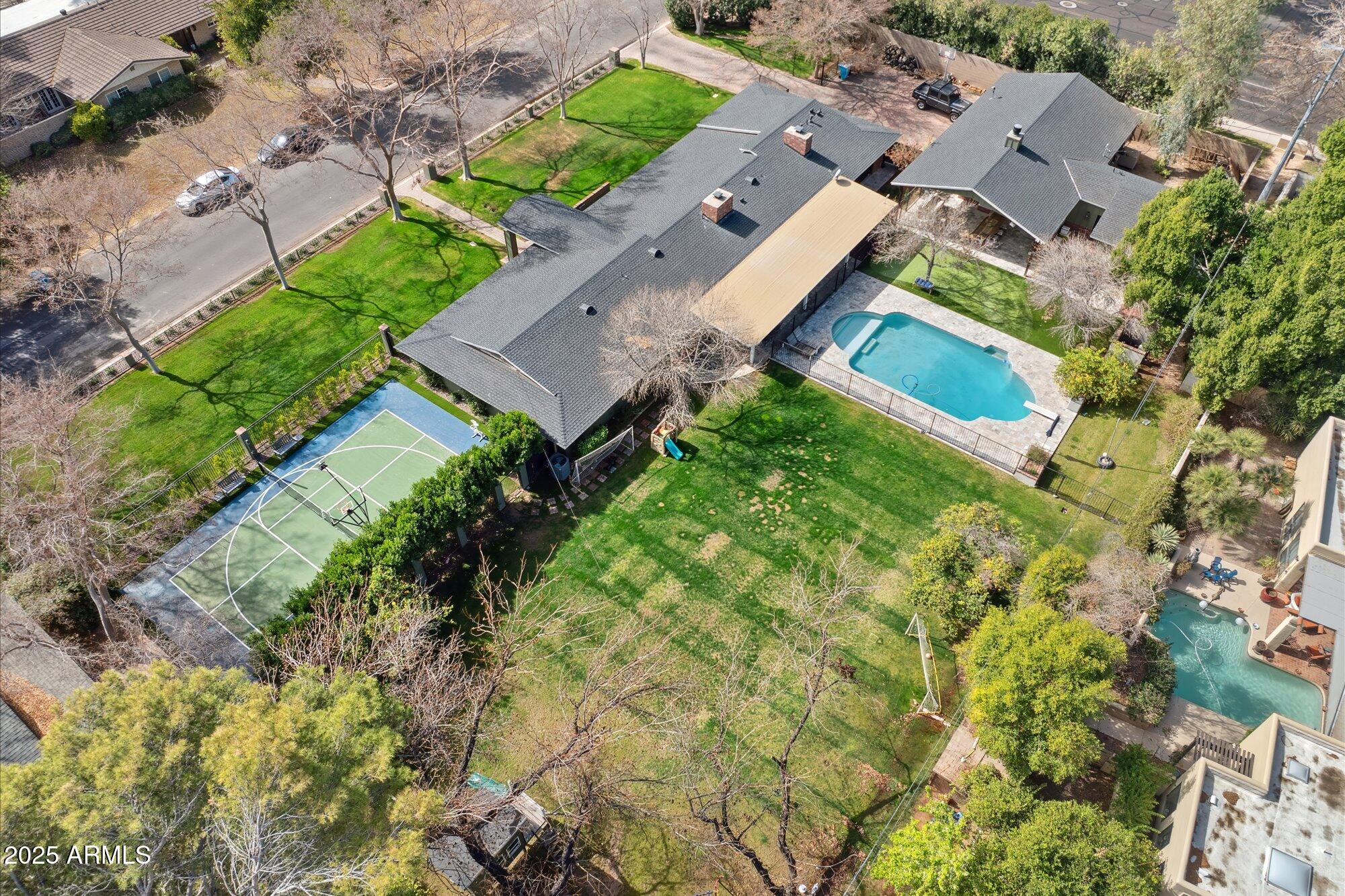 620 West McLellan Boulevard Phoenix, AZ 85013 - Photo 5 of 26 an aerial view of a house with a yard