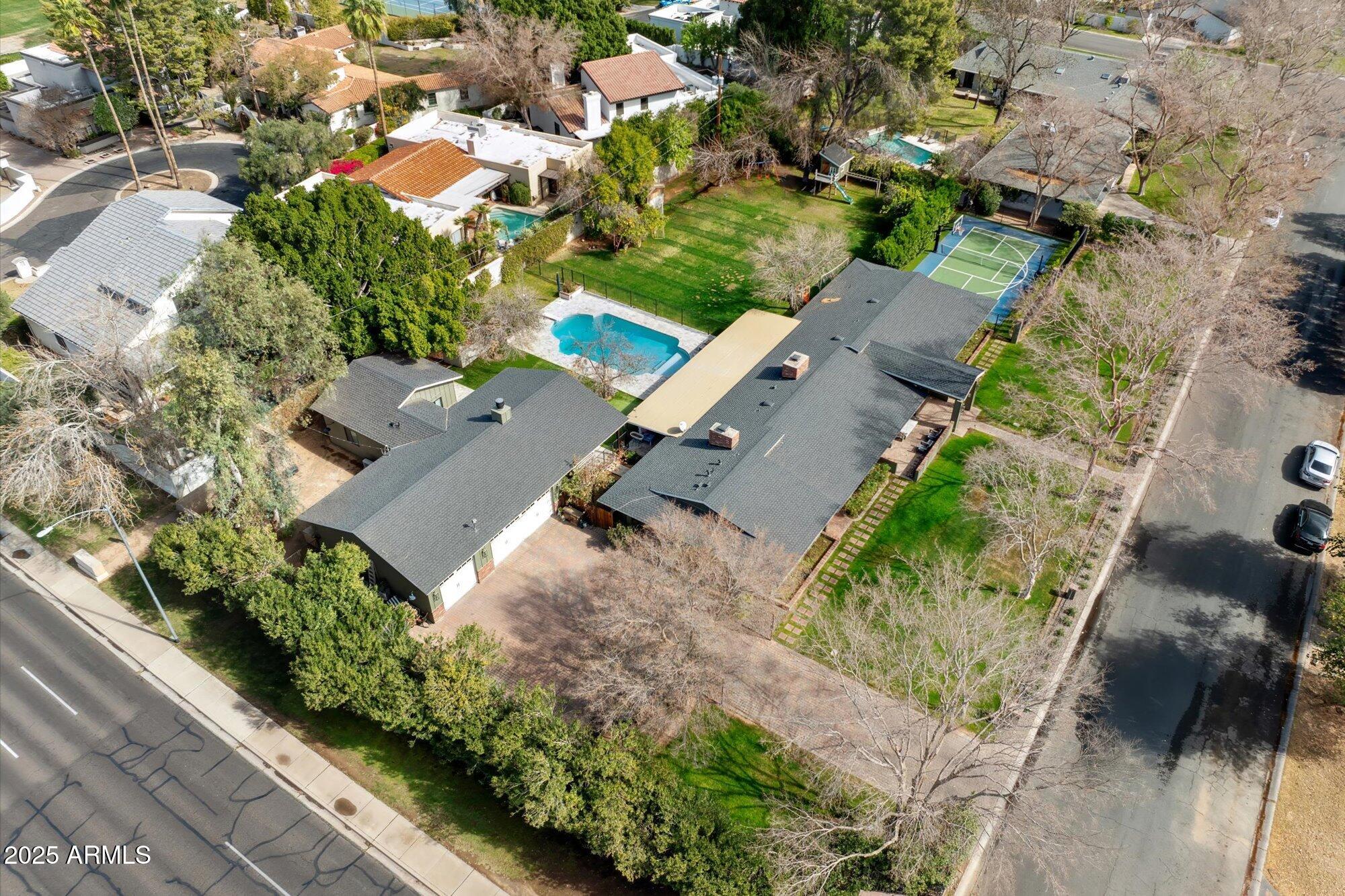 620 West McLellan Boulevard Phoenix, AZ 85013 - Photo 7 of 26 an aerial view of a house with a yard and greenery