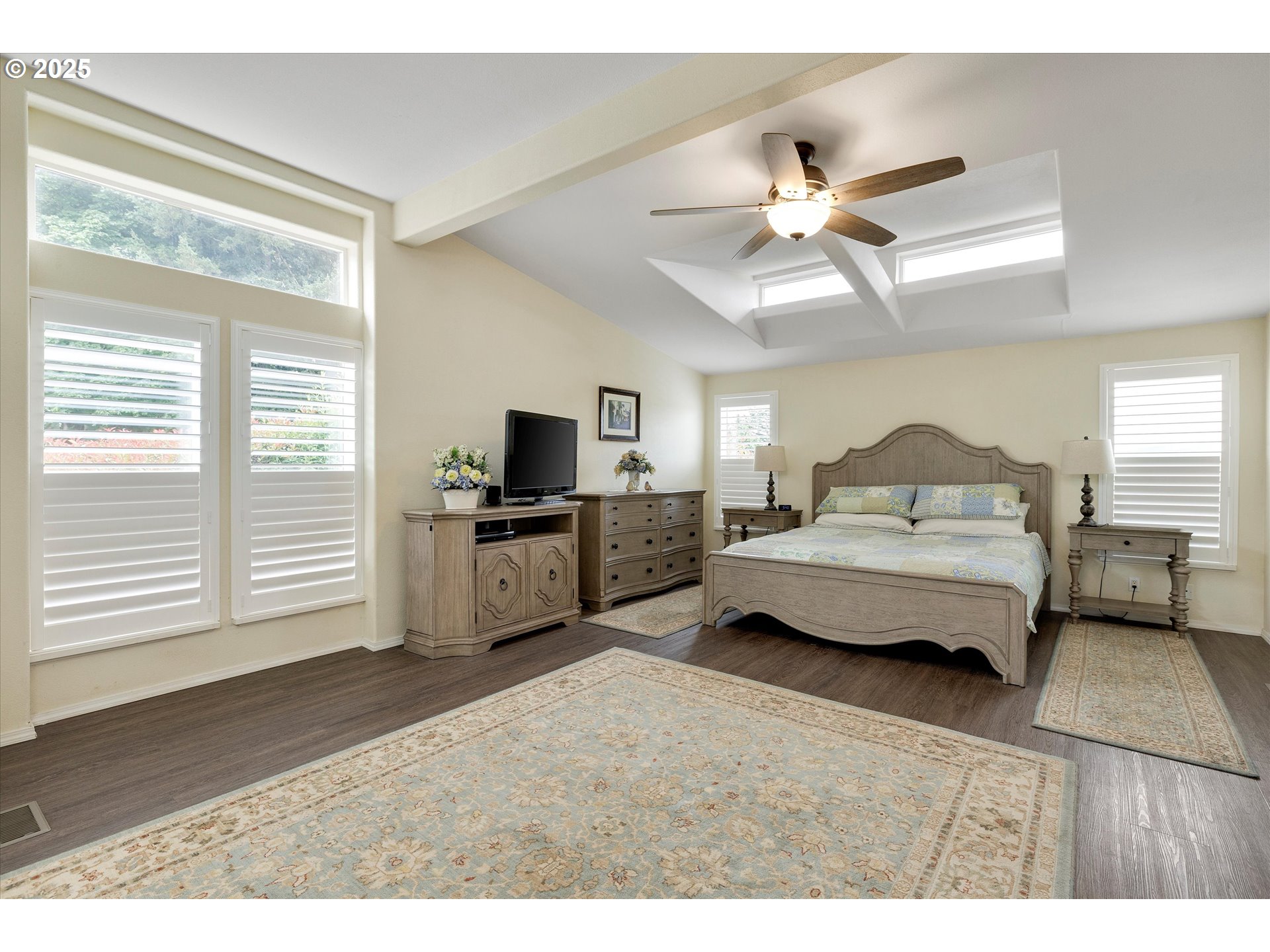 7340-7350 Smith Road Monmouth, OR 97361 - Photo 23 of 40 a living room with furniture and a flat screen tv
