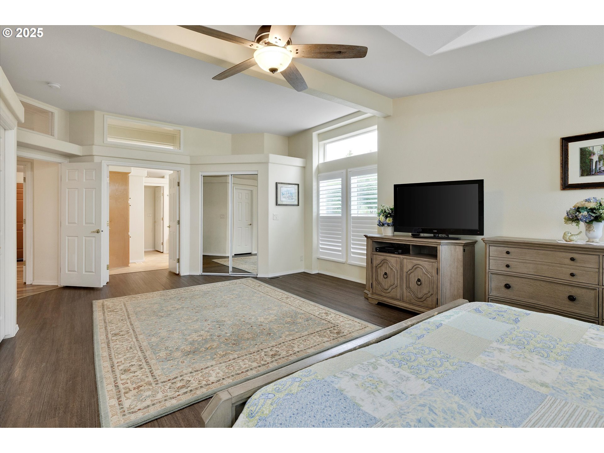 7340-7350 Smith Road Monmouth, OR 97361 - Photo 24 of 40 a bedroom with a bed and a flat screen tv