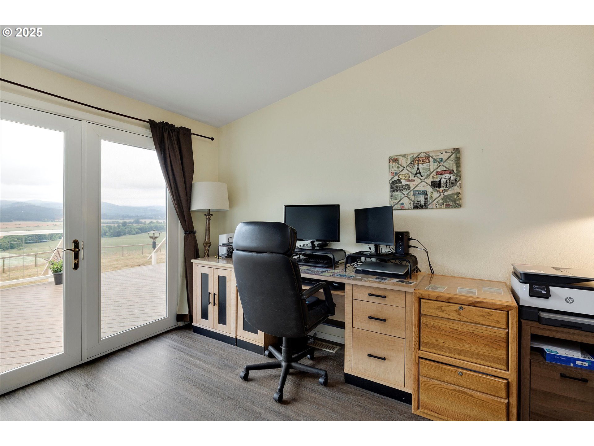 7340-7350 Smith Road Monmouth, OR 97361 - Photo 25 of 40 a view of a workspace with furniture and a window