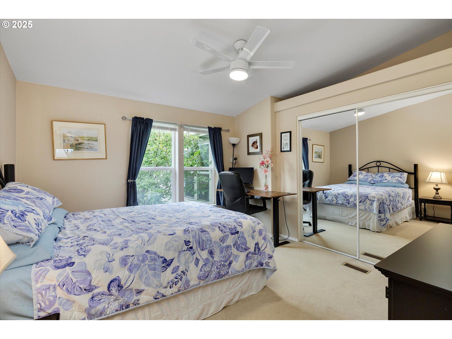 7340-7350 Smith Road Monmouth, OR 97361 - Photo 28 of 40 a bedroom with a bed and a large mirror with window