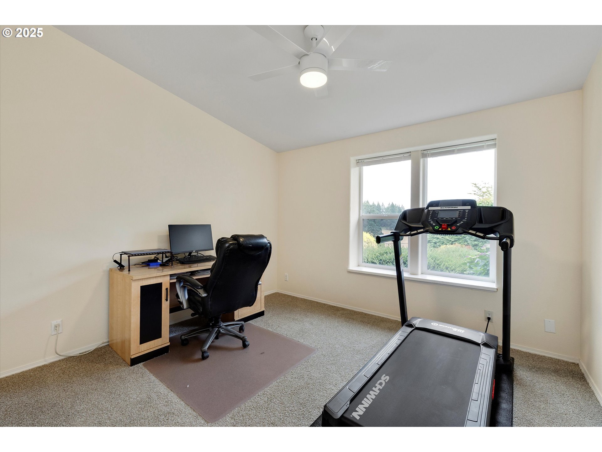 7340-7350 Smith Road Monmouth, OR 97361 - Photo 30 of 40 a view of a workspace with furniture and a window