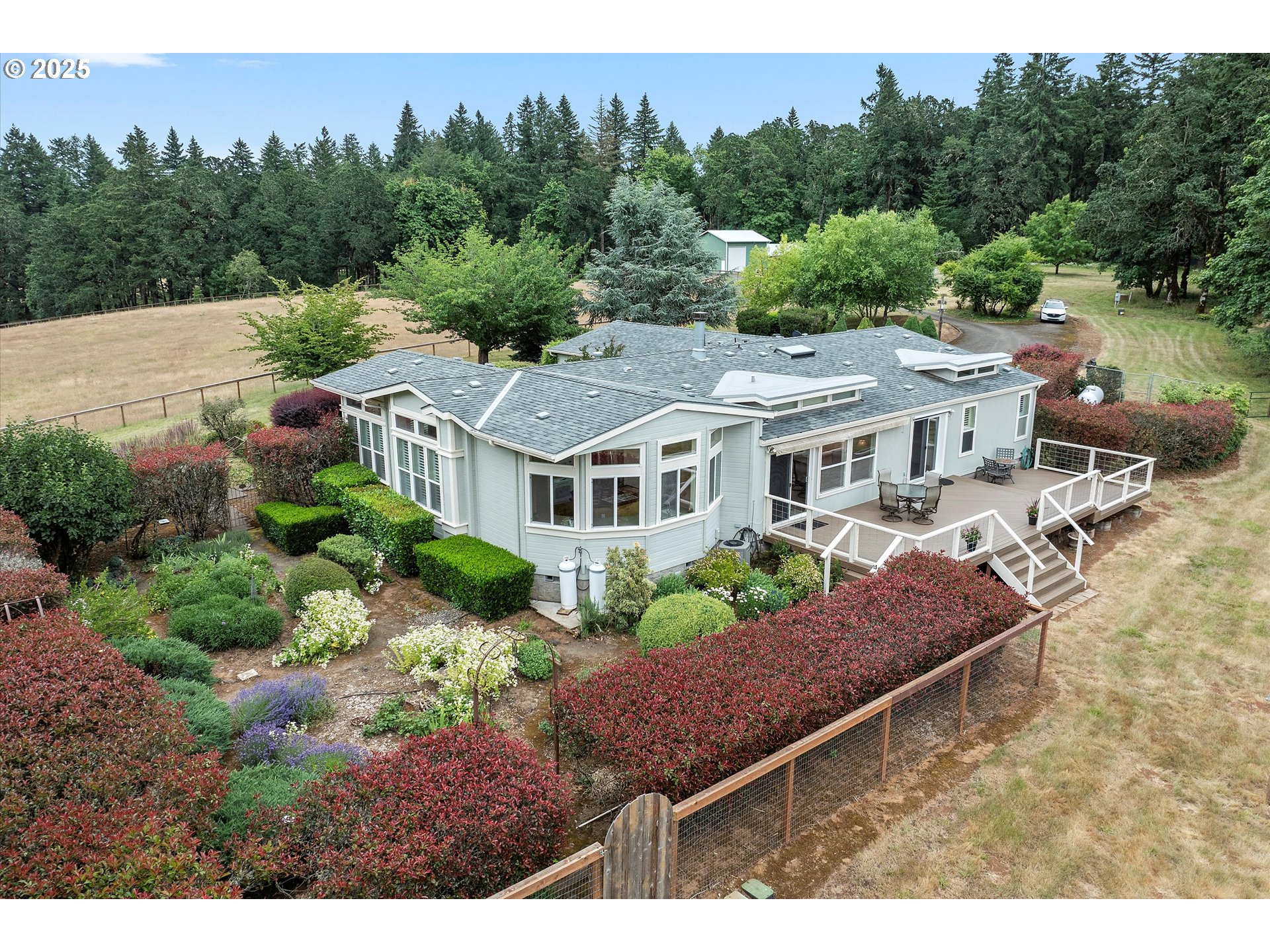 7340-7350 Smith Road Monmouth, OR 97361 - Photo 4 of 40 a aerial view of a house with a yard