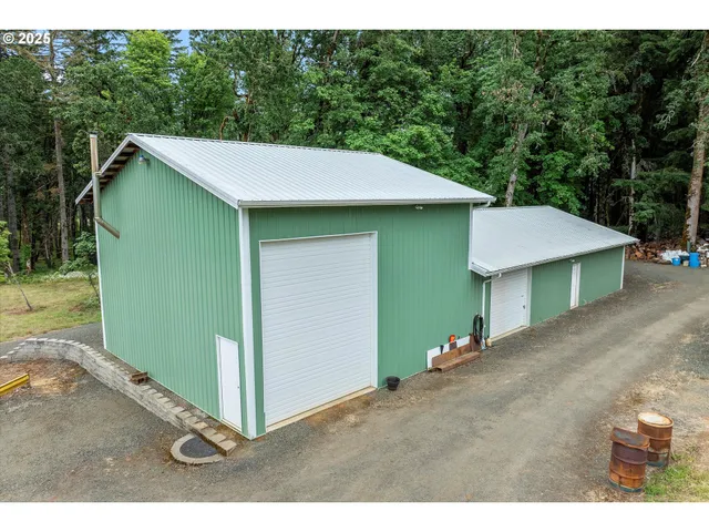 a backyard of a house with a yard and lake view