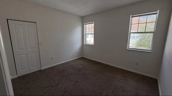 an empty room with windows