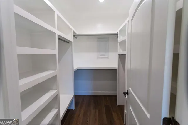 a bathroom with a double vanity sink mirror and