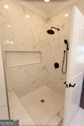 a kitchen with cabinets appliances a sink and a window