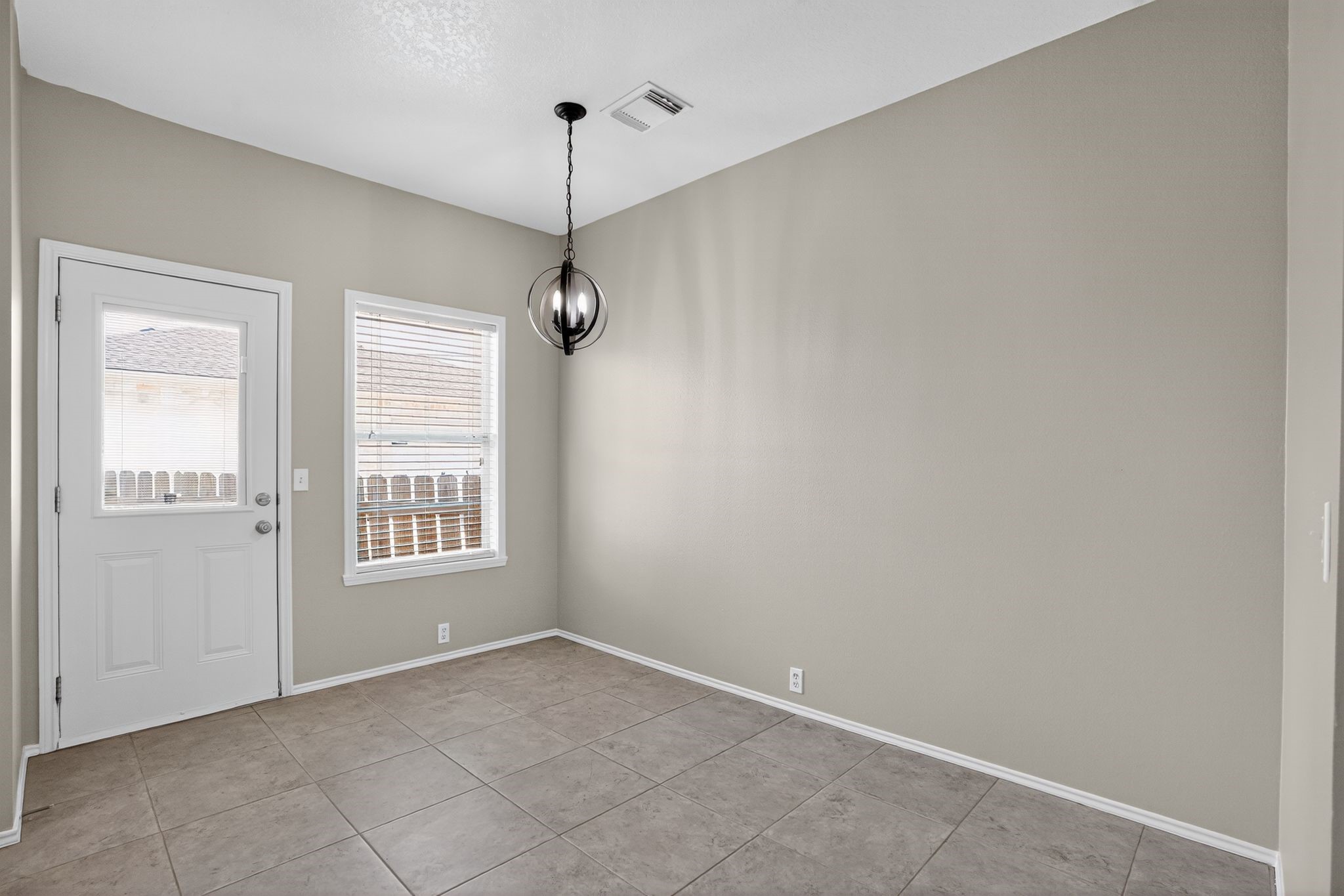 2814 Legends Crest Drive Spring, TX 77386 - Photo 17 of 34 a view of an empty room with a window