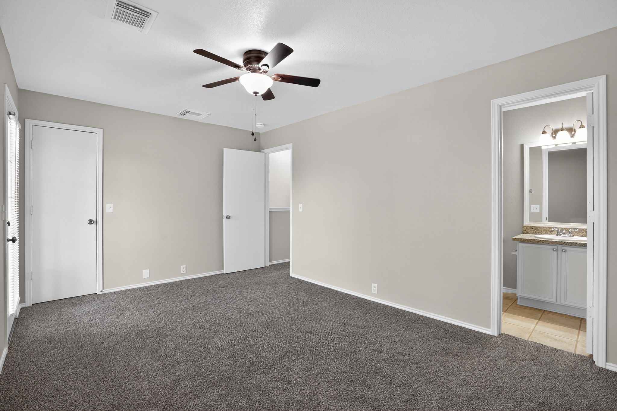 2814 Legends Crest Drive Spring, TX 77386 - Photo 21 of 34 a view of an empty room with a bathroom