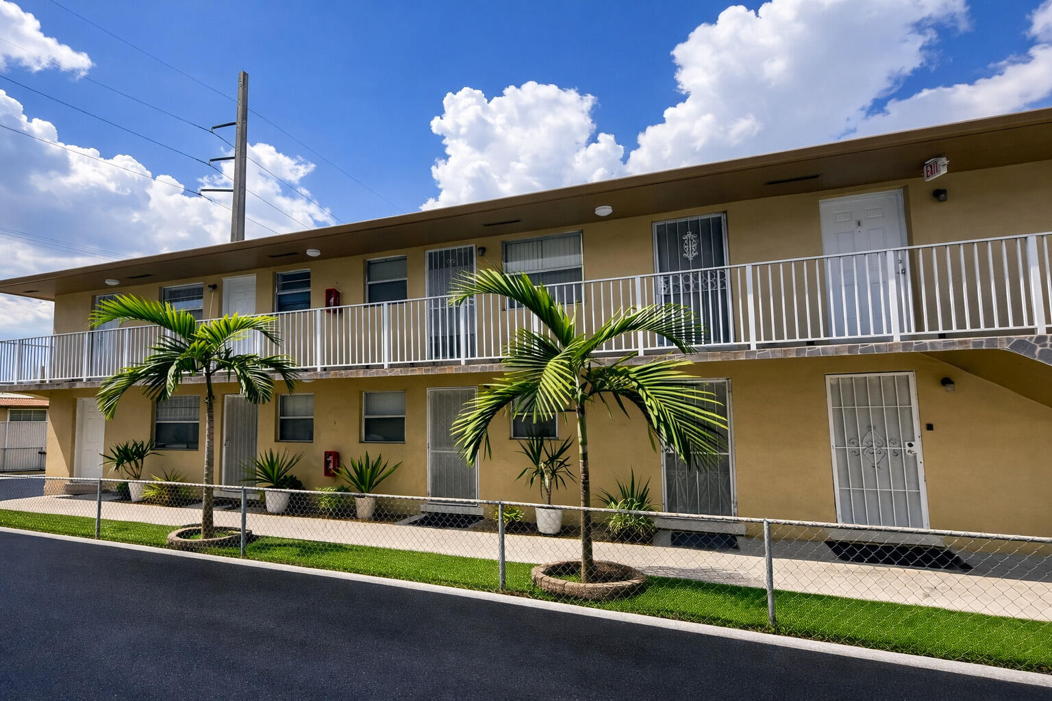 715 West 29th Street Hialeah, FL 33012 - Photo 1 of 6 a front view of a house with garden