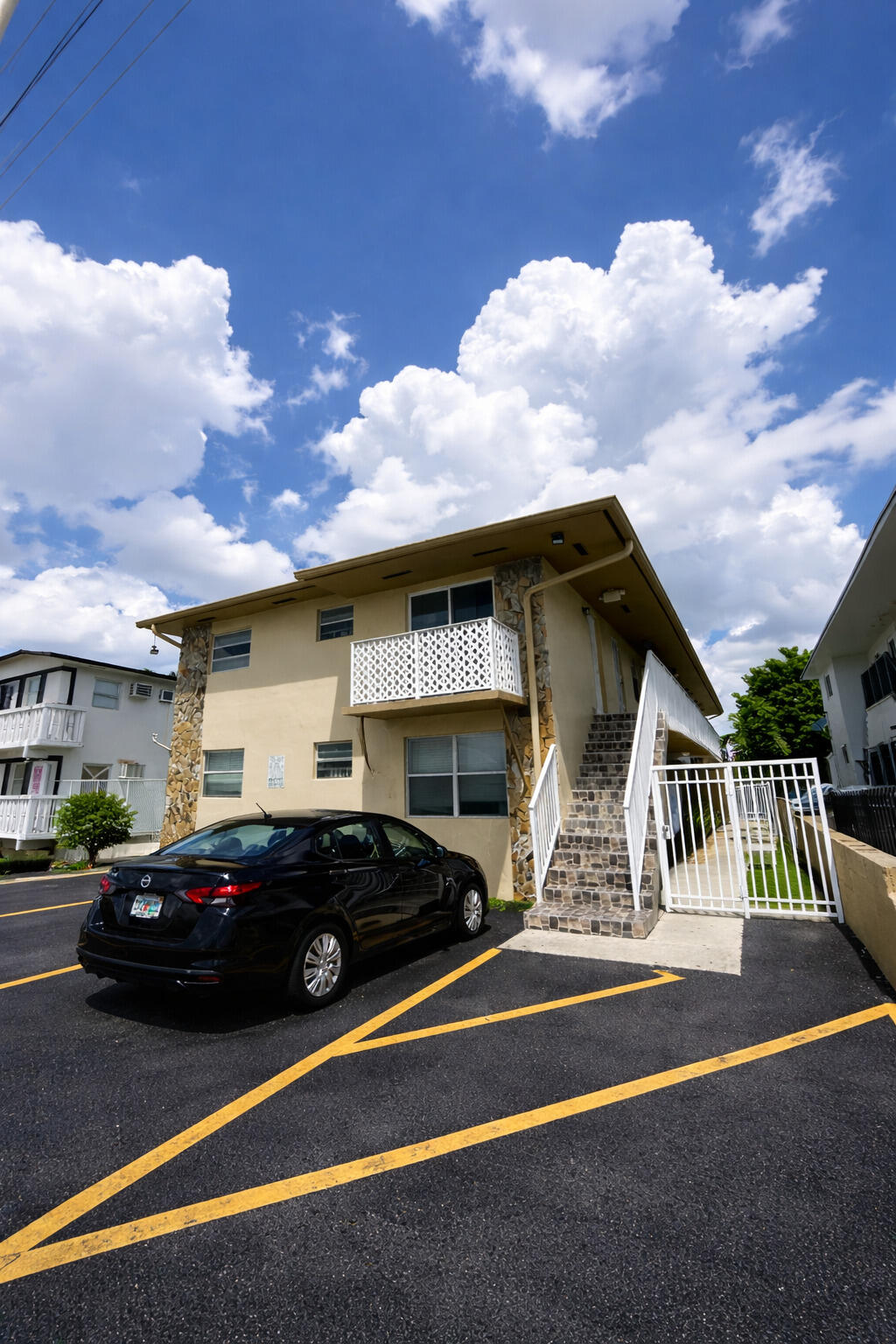 715 West 29th Street Hialeah, FL 33012 - Photo 2 of 6 a view of street with parked cars