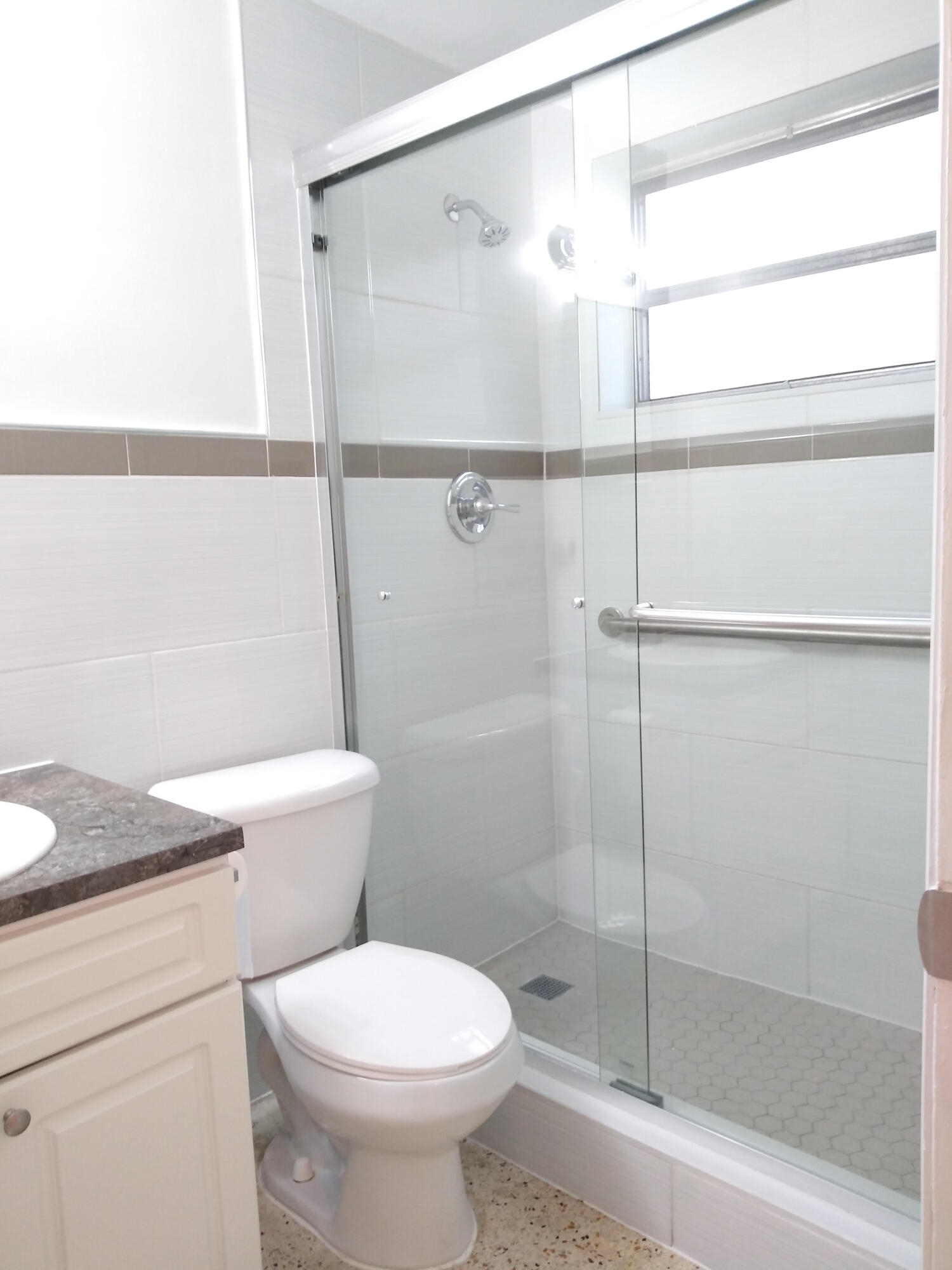 715 West 29th Street Hialeah, FL 33012 - Photo 5 of 6 a white toilet sitting next to a bath tub