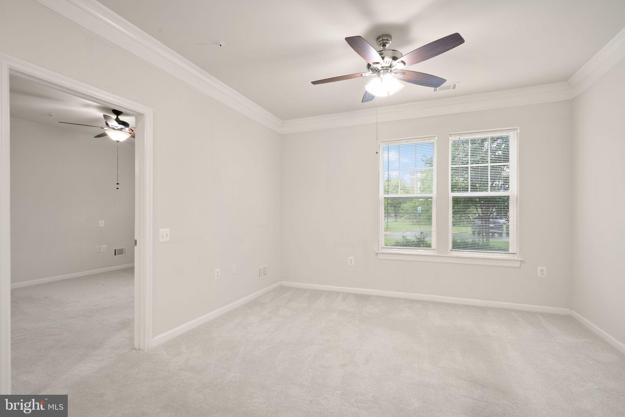 20610 Hope Spring Terrace, Unit 104 Ashburn, VA 20147 - Photo 9 of 38 Living Room