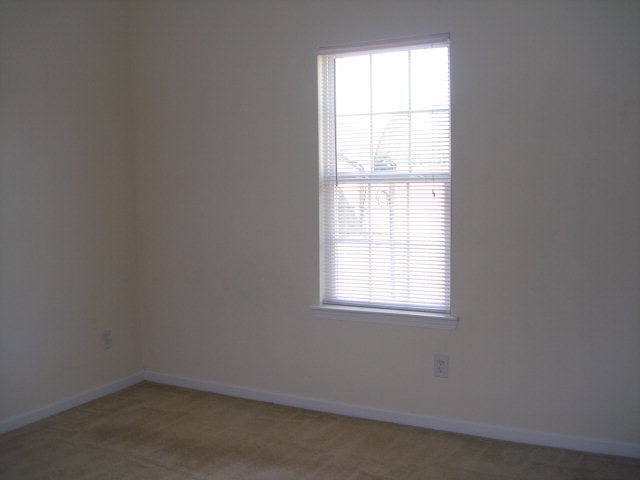 421 Bob White Road Macon, GA 31216 - Photo 14 of 23 an empty room with a window
