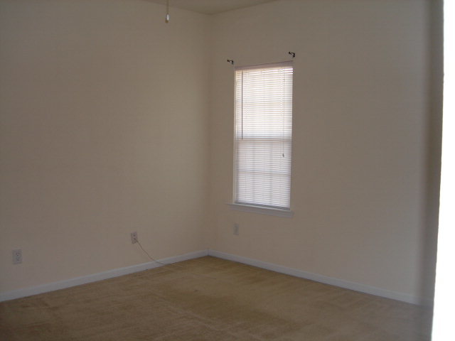 421 Bob White Road Macon, GA 31216 - Photo 15 of 23 an empty room with a window