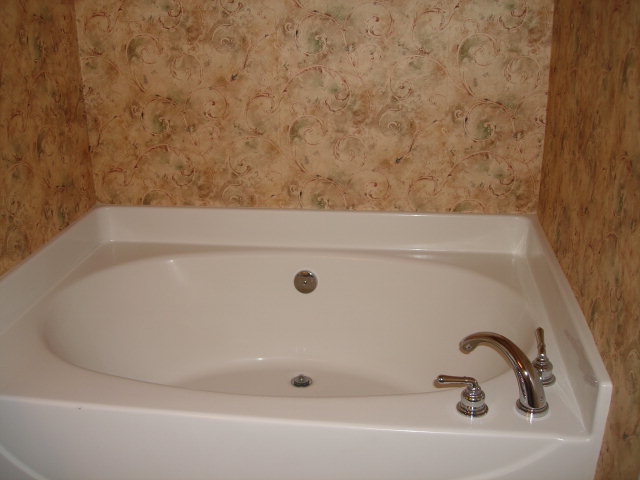 421 Bob White Road Macon, GA 31216 - Photo 16 of 23 a bathroom with a bathtub