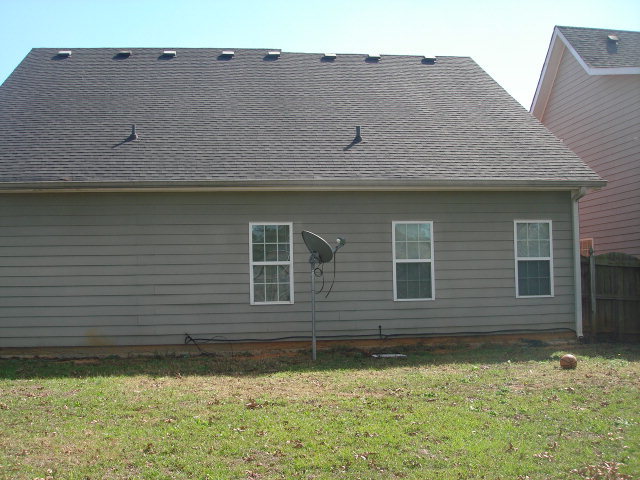 421 Bob White Road Macon, GA 31216 - Photo 21 of 23 a front view of a house with a yard