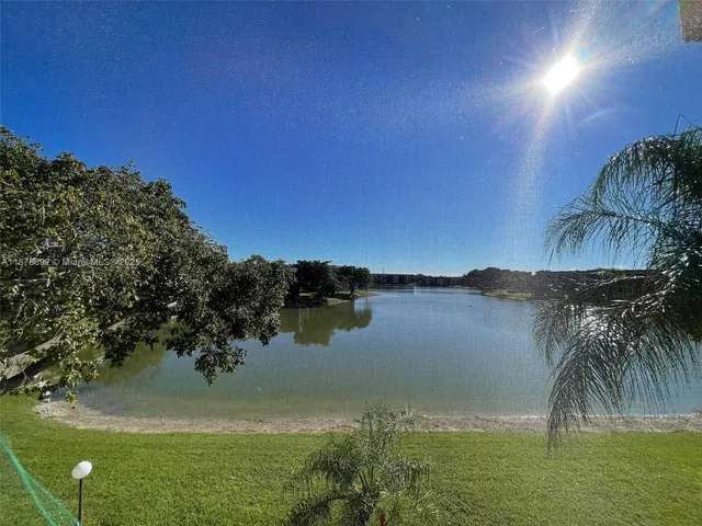 a view of a lake from a yard