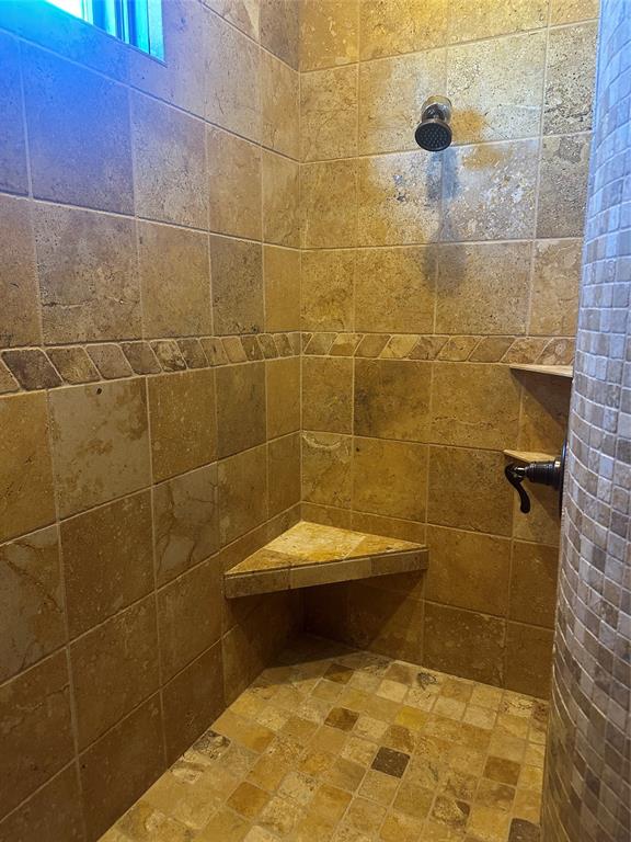 3651 Interstate 30 Frontage Road Sulphur Springs, TX 75482 - Photo 4 of 14 a bathroom with a sink and shower