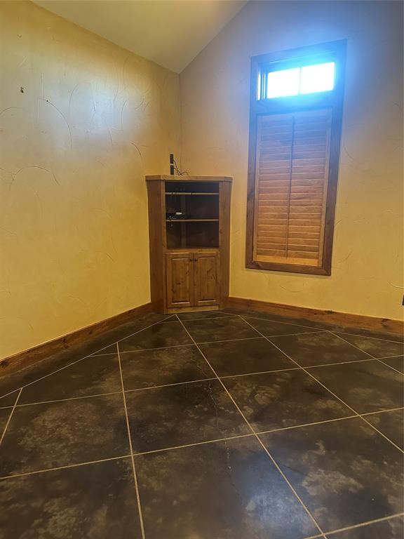 3651 Interstate 30 Frontage Road Sulphur Springs, TX 75482 - Photo 5 of 14 a bathroom with a sink and a mirror