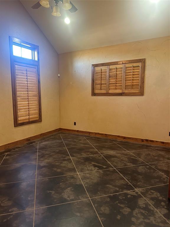 3651 Interstate 30 Frontage Road Sulphur Springs, TX 75482 - Photo 6 of 14 an empty room with wooden floor and windows