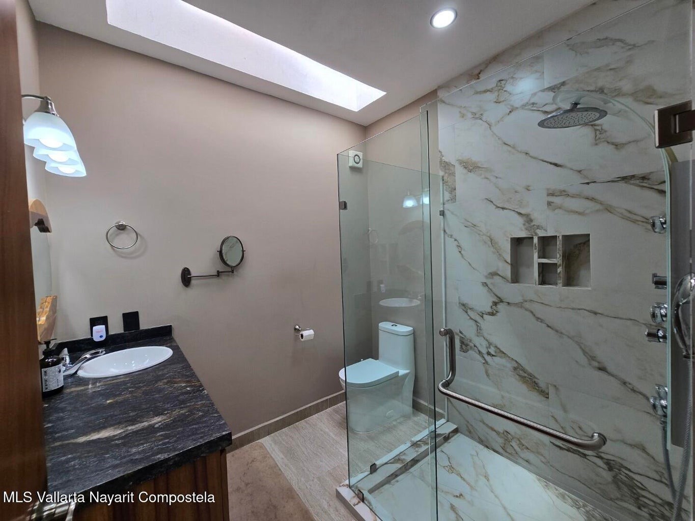 1 Abedul Bell City, MO 63735 - Photo 25 of 38 a bathroom with a sink a toilet and shower