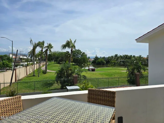 a view of a garden and basketball court