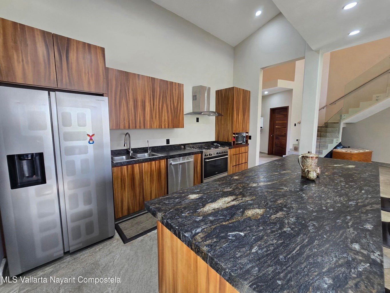 1 Abedul Bell City, MO 63735 - Photo 7 of 38 a kitchen with stainless steel appliances granite countertop a refrigerator a stove and a sink