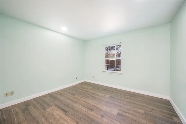 a view of a house with a yard and garage