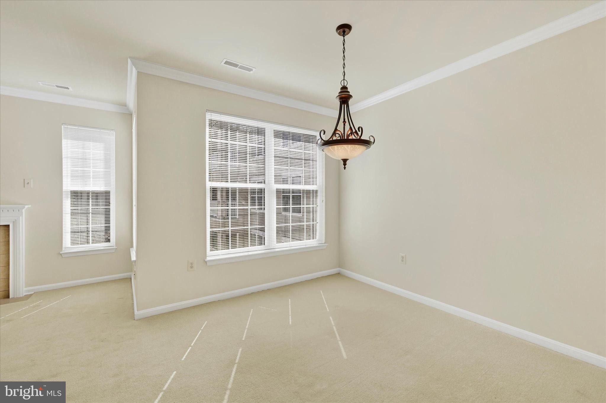 400 Symphony Circle, Unit 414 Hunt Valley, MD 21030 - Photo 13 of 29 a view of a room with windows