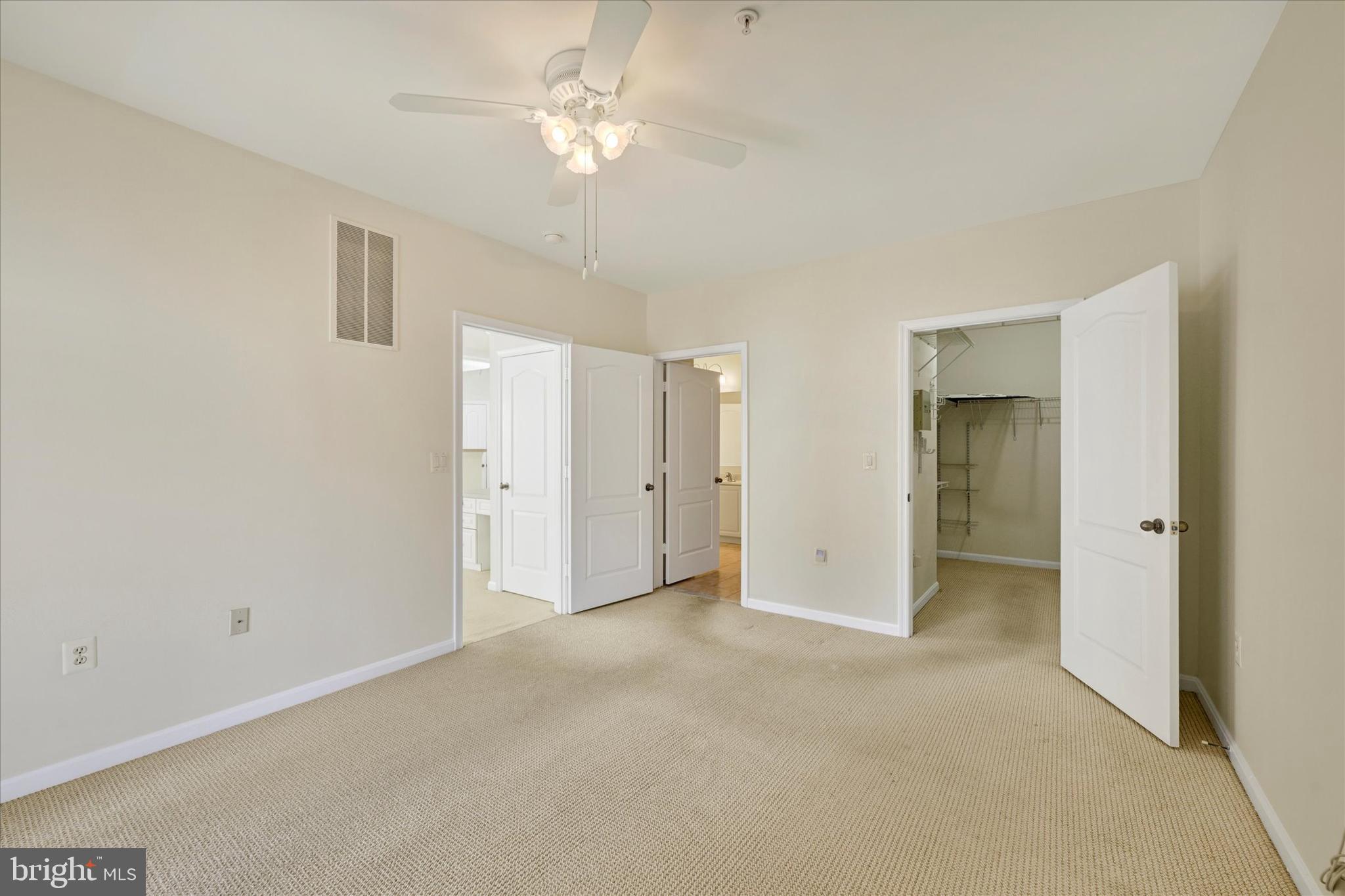 400 Symphony Circle, Unit 414 Hunt Valley, MD 21030 - Photo 15 of 29 a view of an empty room with a bathroom