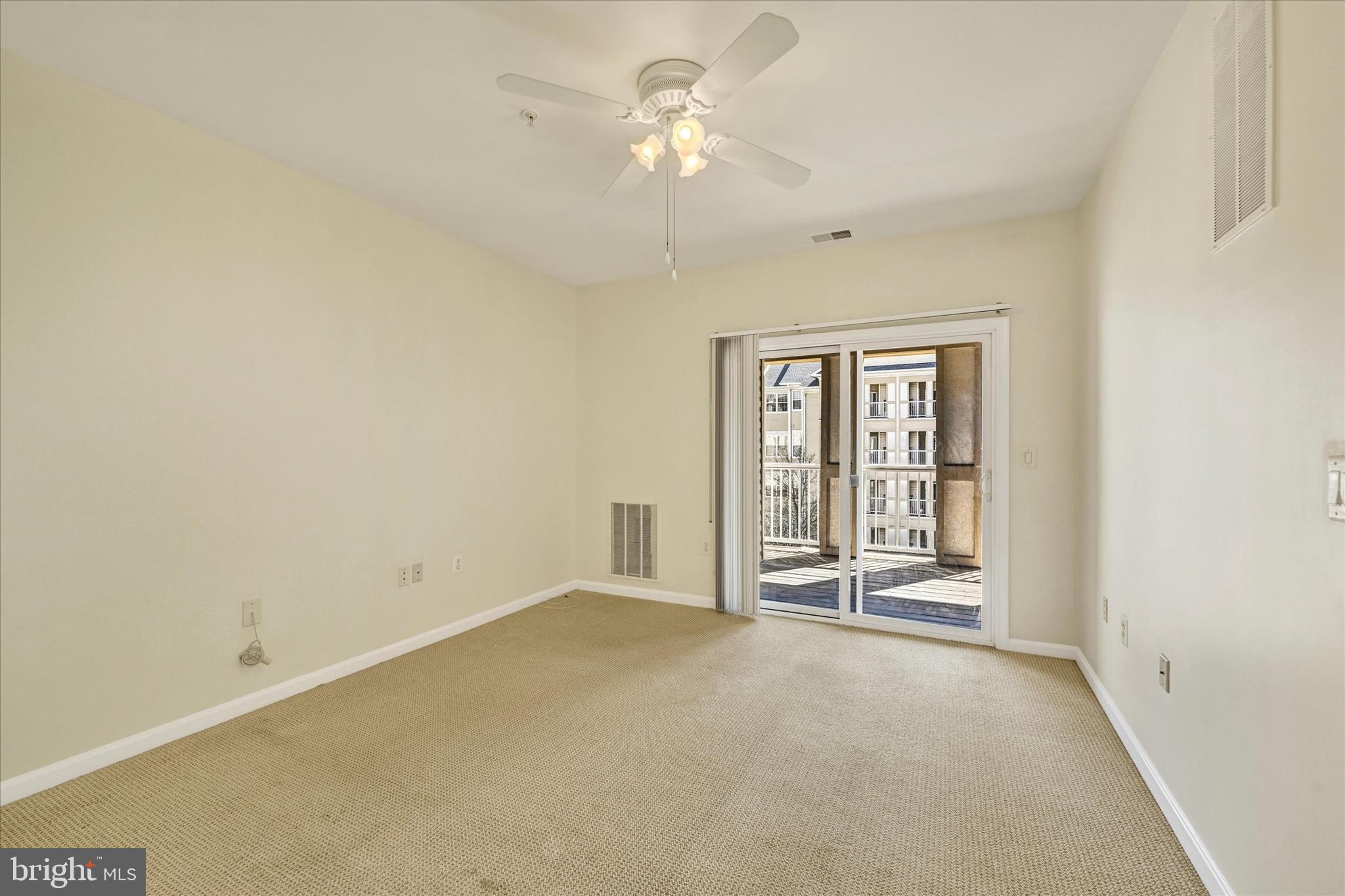 400 Symphony Circle, Unit 414 Hunt Valley, MD 21030 - Photo 16 of 29 a view of an empty room with a window