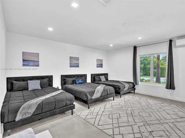 a bathroom with a shower and a mirror