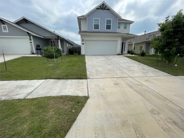a front view of house with yard