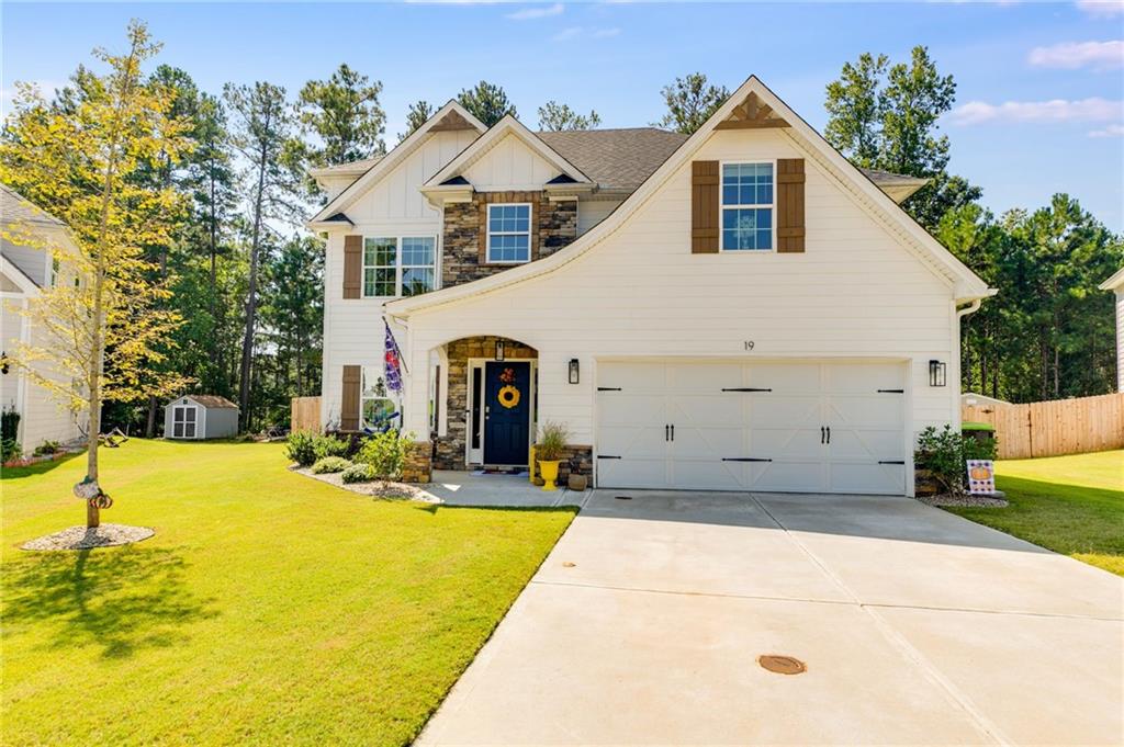 19 Boyd Point Newnan, GA 30265 - Photo 1 of 1 a view of a white house with swimming pool in front of it