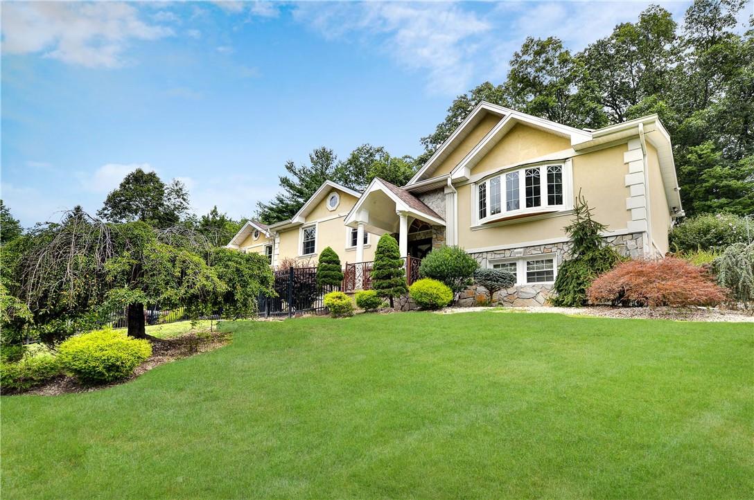 88 Westview Road Spring Valley, NY 10977 - Photo 1 of 1 a view of a house with a yard