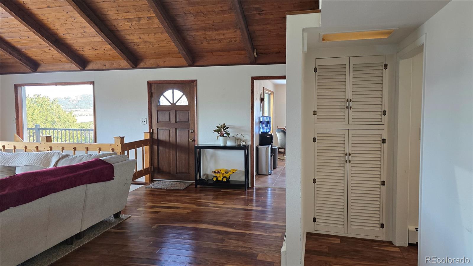 411 Gruenberg Road Fort Garland, CO 81133 - Photo 19 of 41 a view of a livingroom with furniture and windows
