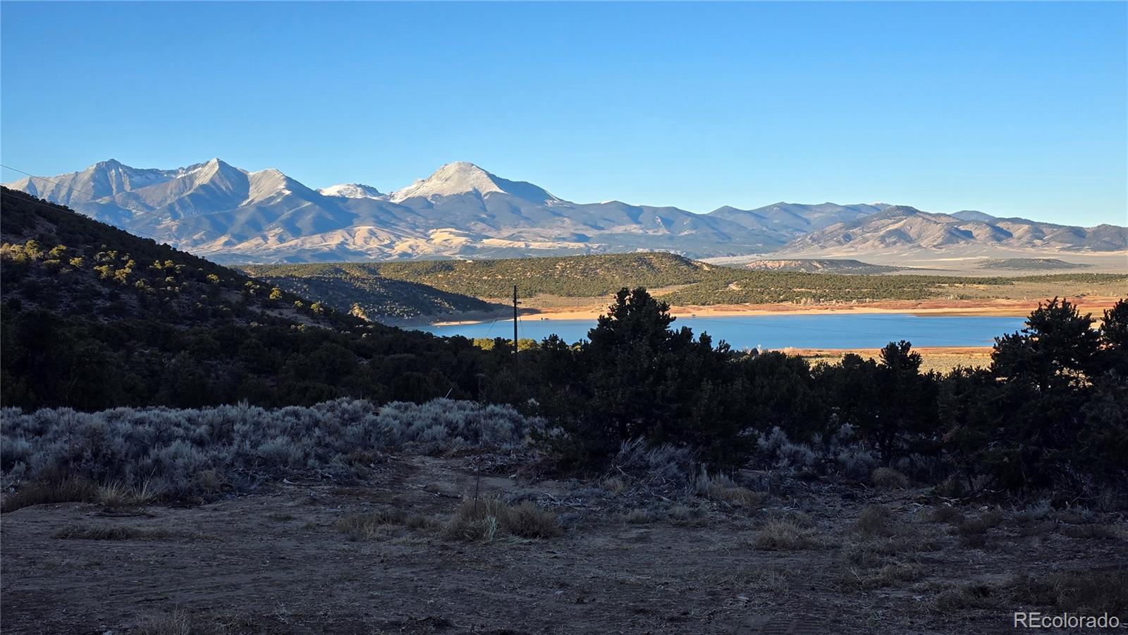 411 Gruenberg Road Fort Garland, CO 81133 - Photo 37 of 41 a view of lake with mountain