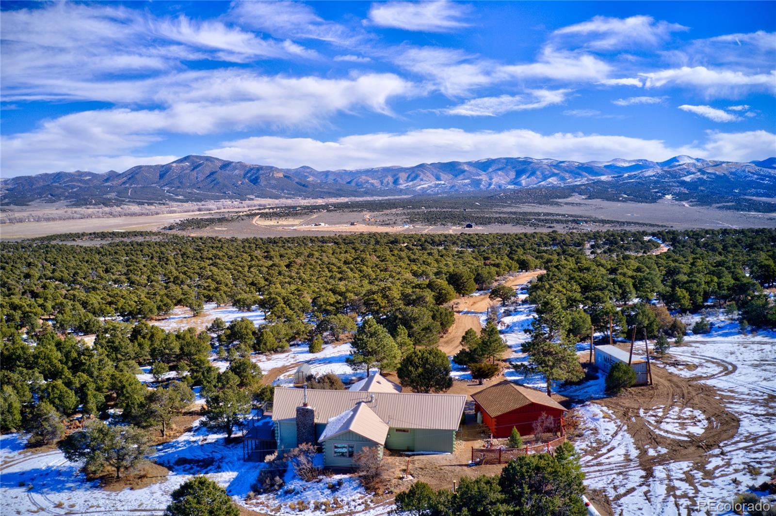 411 Gruenberg Road Fort Garland, CO 81133 - Photo 8 of 41 a view of a city with lots of residential buildings ocean and mountain view in back