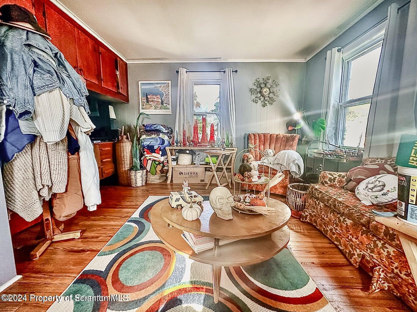 218 Hand Street, Unit 2 Jessup, PA 18434 - Photo 4 of 15 a living room with furniture and wooden floor