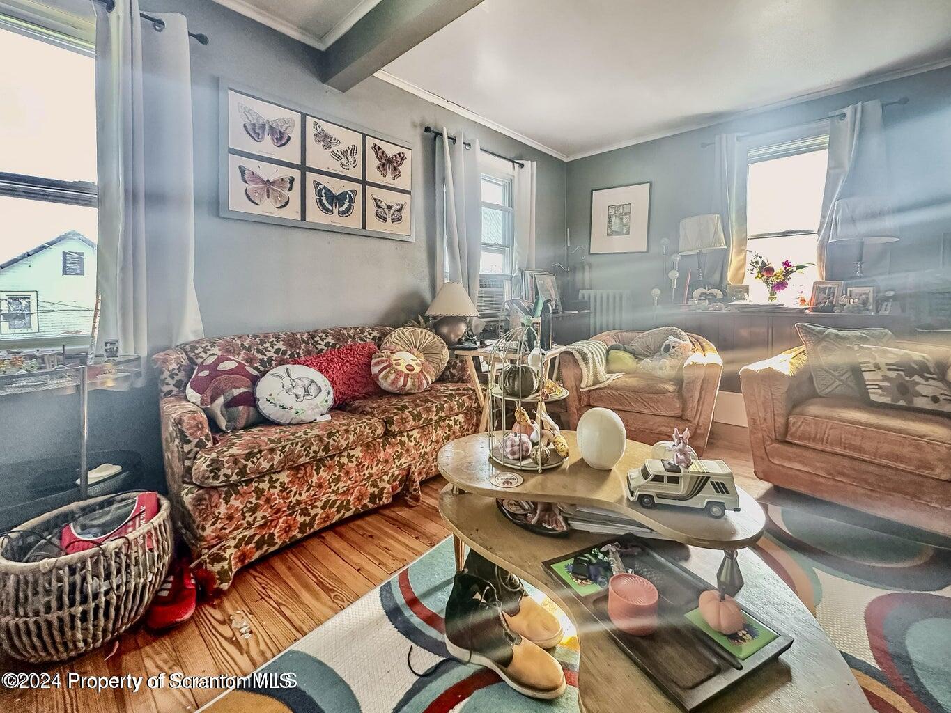 218 Hand Street, Unit 2 Jessup, PA 18434 - Photo 5 of 15 a living room with furniture and rug